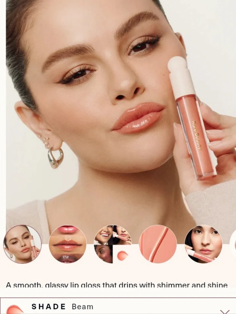 RARE BEAUTY Beam Lip Gloss — Peachy Coral with Pink Pearl